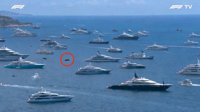 The image shows a large body of water filled with numerous boats, including yachts and luxury liners. Among these vessels are several white boats that appear to be sailing or floating near each other. The boats vary in size and design, creating an overall sense of depth and scale within the scene. The post features a photo of a boat on the water, which is likely related to the Crypto Summer event taking place in the summer of 2026.