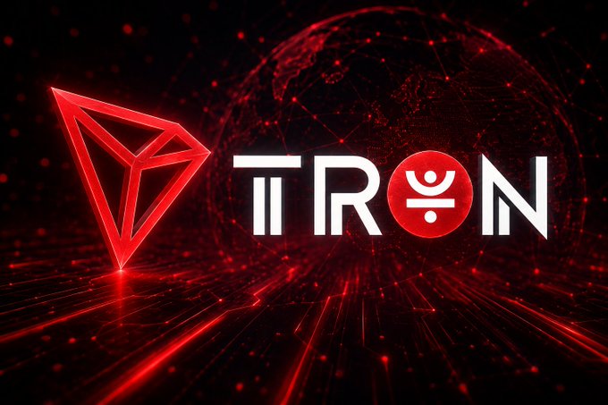 The image displays the TRON logo alongside its iconic red diamond-shaped emblem, set against a futuristic dark background featuring a glowing digital globe and radiating light trails. This visual ties directly to the post's message, as TRON's branding represents the network where these user experience improvements—GasFree transactions, USDD support, and JustLend DAO—are being implemented to make the platform more accessible for newcomers.