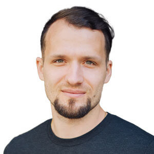 A headshot photo of a man with short dark hair and a goatee, presumably Anton Bukov, who according to the post has departed from the 1inch project he co-founded.