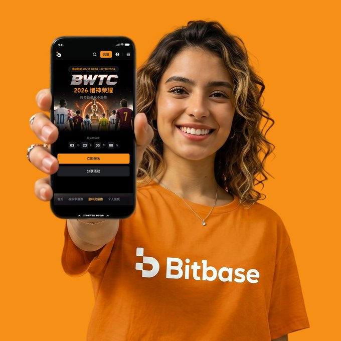 A smiling woman wearing an orange "Bitbase" t-shirt holds up a smartphone displaying a BWTC 2026 tournament registration page with a countdown timer (03D 23H 00M), visually supporting the post's call to action by showing the "one tap" entry point to the arena.