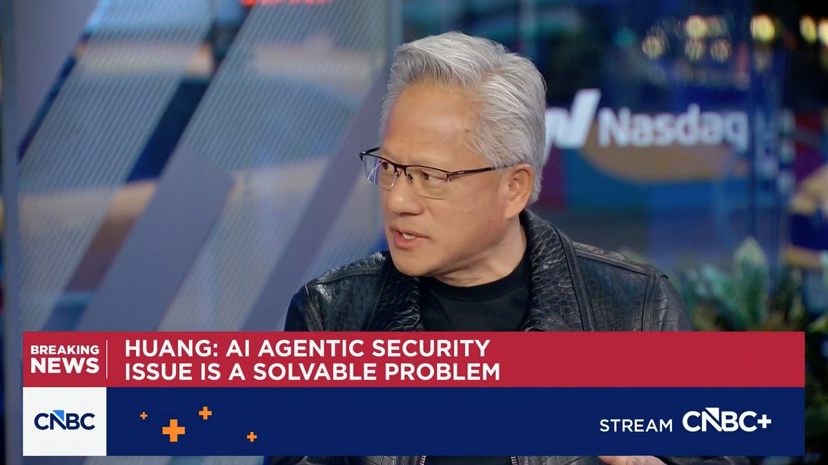 A CNBC news interview with Jensen Huang of Nvidia, featuring the headline 'HUANG: AI AGENTIC SECURITY ISSUE IS A SOLVABLE PROBLEM' displayed at the Nasdaq studio.