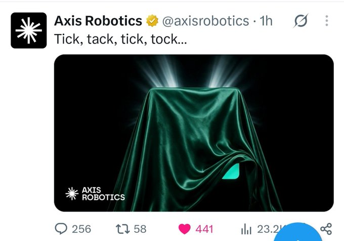 A Twitter post by Axis Robotics (@axisrobotics) captioned 'Tick, tack, tick, tock...' showing a green silk cloth draped over an object as if revealing a new product.