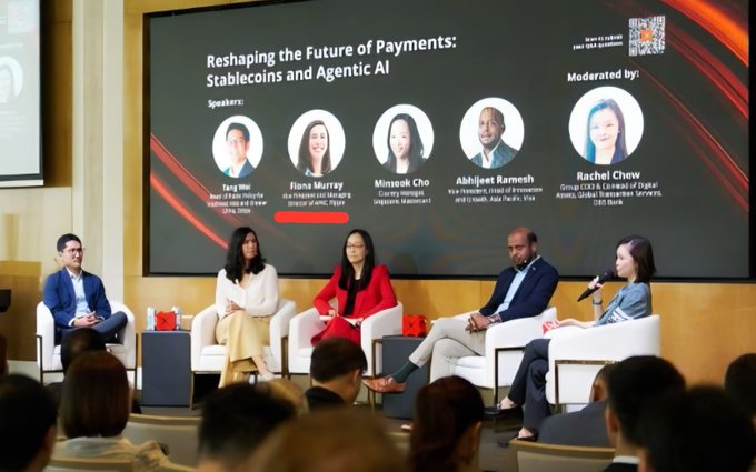 A panel discussion titled "Reshaping the Future of Payments: Stablecoins and Agentic AI" featuring speakers Tang Wei (Ripple), Fiona Murray (Mastercard), Minseok Cho, Abhijeet Ramesh (Visa), and moderator Rachel Chew (DBS), highlighting the collaboration between Ripple and major financial players like Mastercard, Visa, and DBS on emerging payment technologies.