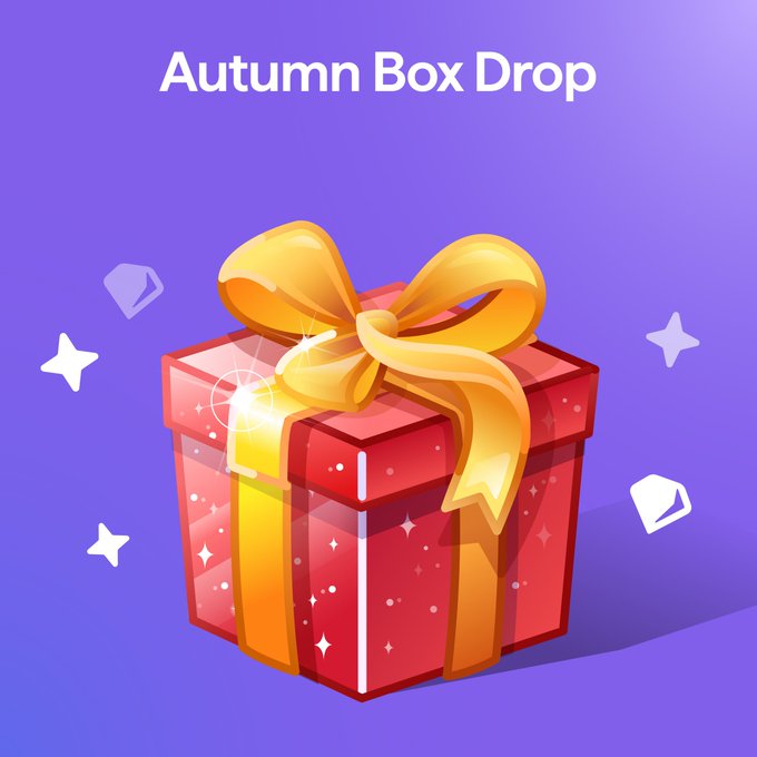 A promotional graphic with the text 'Autumn Box Drop' featuring an illustrated red gift box with a golden yellow ribbon and bow against a purple gradient background.