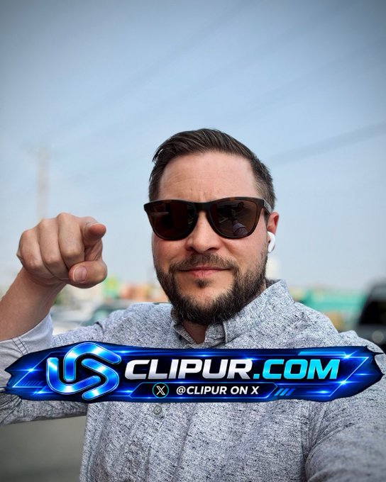 A man wearing sunglasses and a gray patterned shirt with earbuds points at the camera, overlaid with a "CLIPUR.COM" branded banner reading "@CLIPUR ON X".
