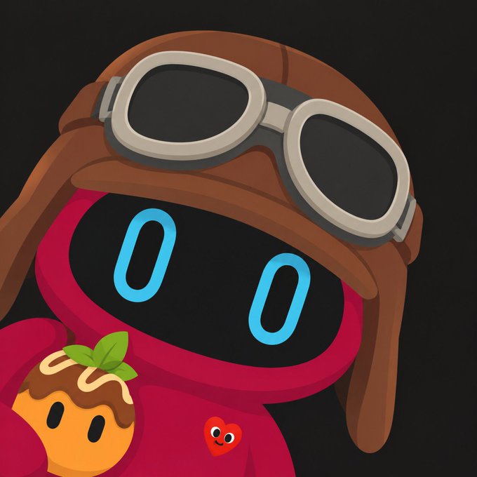 A cute cartoon robot character wearing a brown aviator hat with goggles and a red hoodie, holding a small orange tomato-like figure and featuring a small heart face on its chest.
