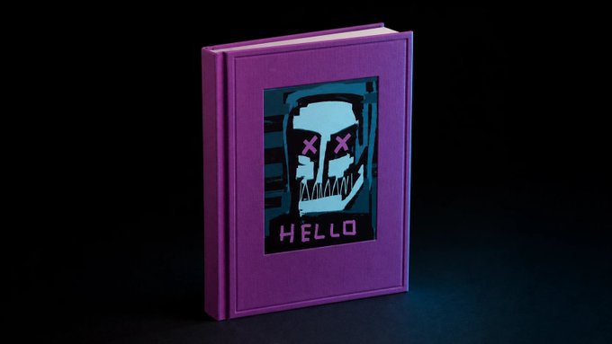 A purple book stands against a dark background, featuring a pixelated skull design with X eyes and the word "HELLO" on its cover.