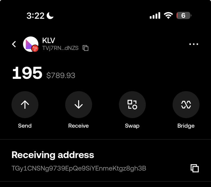 A cryptocurrency wallet screenshot shows a "KLV" token with a balance of 195 (worth $789.93), displaying a receiving address and options to Send, Receive, Swap, and Bridge. The image supports the post by showing the token in question, with the user seeking verification of its authenticity.