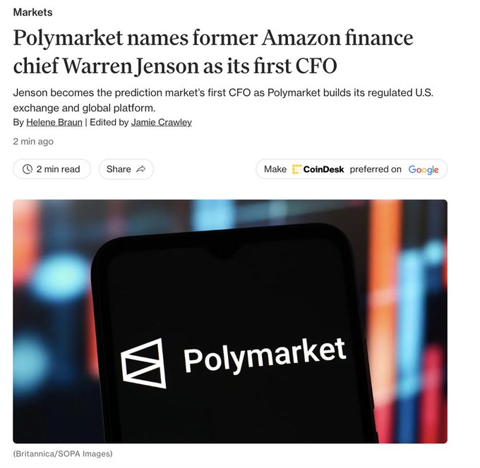 A CoinDesk article headline reads "Polymarket names former Amazon finance chief Warren Jenson as its first CFO," accompanied by an image of the Polymarket logo on a smartphone screen against a colorful background. The caption reports the company's hiring of Jenson as its inaugural CFO to lead finance and long-term planning.