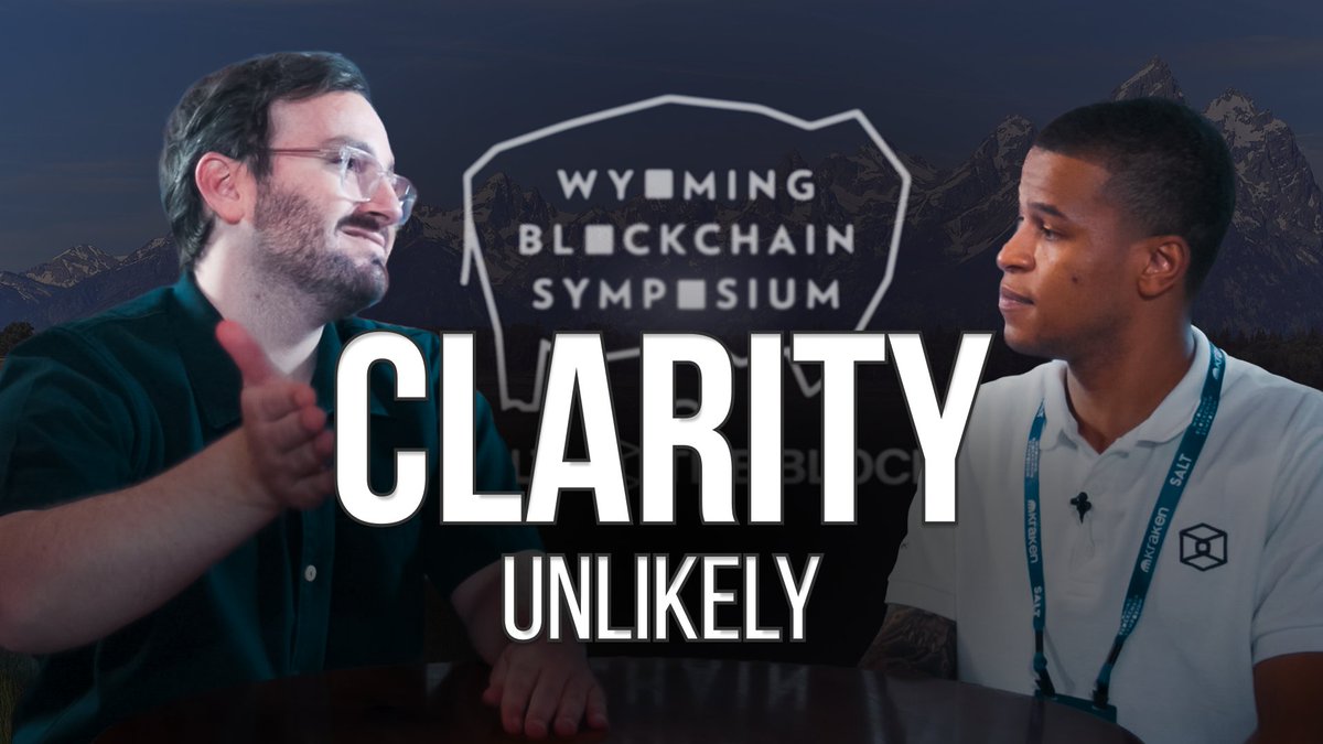 A YouTube-style thumbnail for the 'Wyoming Blockchain Symposium' featuring two men in conversation with large white text overlay reading 'CLARITY UNLIKELY'.