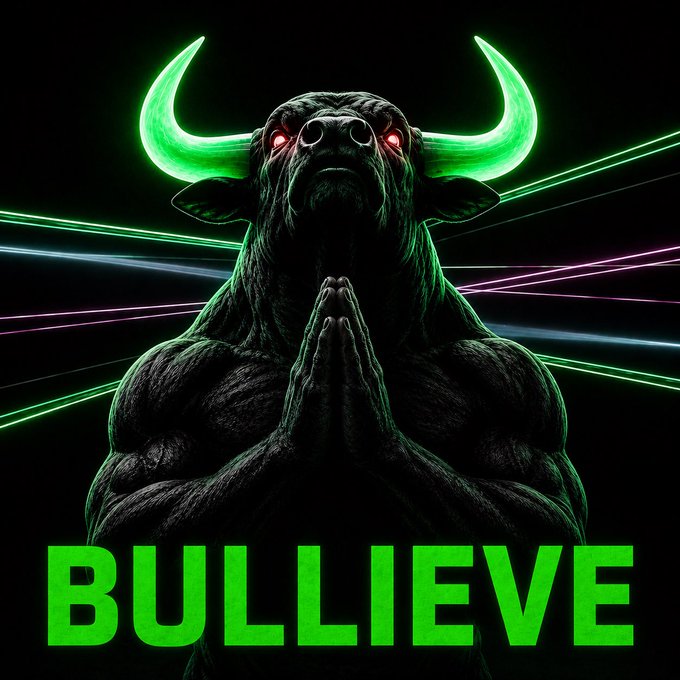 A powerful black bull with glowing neon green horns and red eyes stands with hands folded in prayer against a backdrop of vibrant green and pink laser lines, reinforcing the bullish "BULLIEVE" sentiment conveyed in the bold green text at the bottom. The image visually merges the "bull market" hype mentioned in the post with a deity-like reverence, symbolizing faith in the $BULLIEVE ticker as everyone "believes" again.