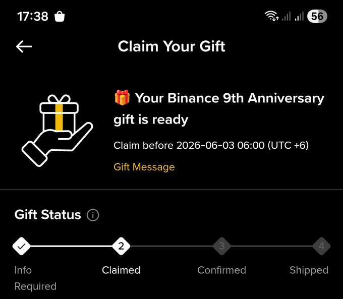 The image shows a message box with a hand holding a gift, which has been claimed by someone named @binance. The text of the message reads "Claim Your Gift" followed by an image of a gift that was sent via email or text. The message also includes details about the Binance 9th anniversary and how it is being celebrated through swag.