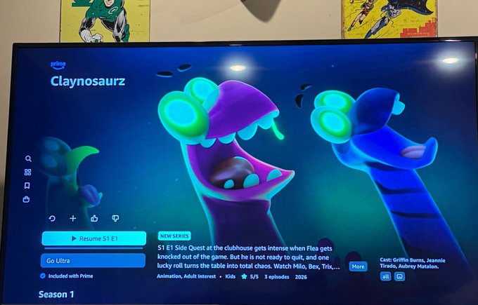 A Prime Video screen displaying the new series "Claynosaurz" Season 1, showing S1 E1: "Side Quest at the clubhouse gets intense when Flex gets knocked out of the game. But he is not ready to quit, and one lucky roll turns the table into total chaos. Watch Milo, Dex, Trix,..." with options to Resume S1 E1 or Go Ultra.