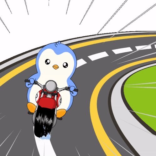 An illustrated cartoon depicts a cute blue and white penguin character riding a red motorcycle on a curving road with speed lines indicating motion.