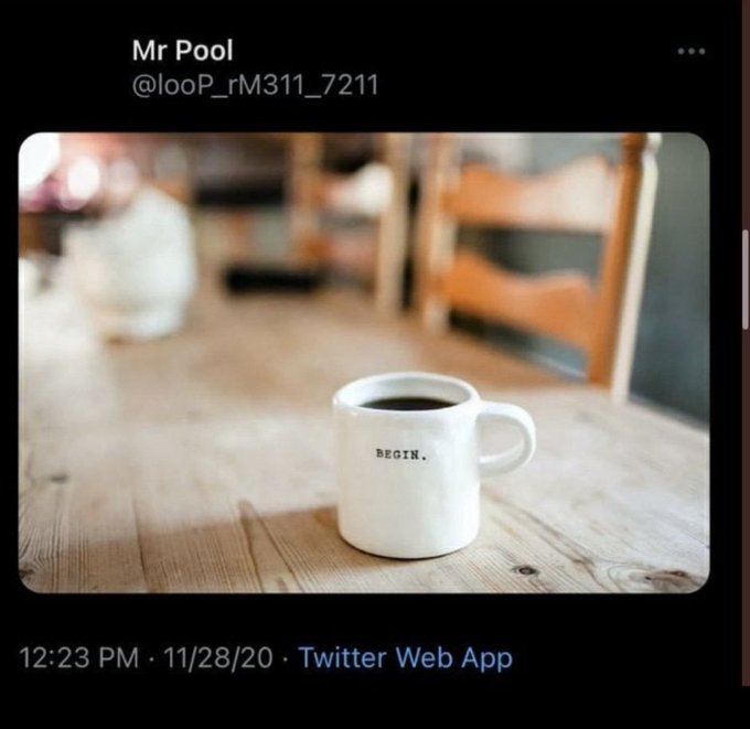 A tweet from Mr Pool (@looP_rM311_7211) showing a white coffee mug on a wooden table with the word 'BEGIN.' printed on it, posted at 12:23 PM on 11/28/20.