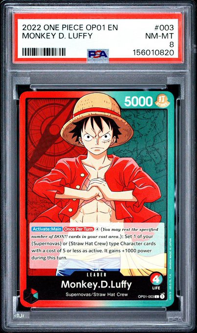 A graded PSA 8 (NM-MT) 2022 ONE PIECE OP01 EN #003 trading card featuring Monkey D. Luffy, Leader of the Supernovas/Straw Hat Crew.