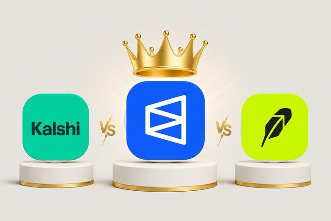 The image features a comparison between two companies, Kalshi and Robinhood, with their logos displayed prominently against a white background. The Kalshi logo is positioned above the Robinhood logo, which is located below it. Both logos are square in shape and share similar colors - blue and gold. The text "Kalshi vs. Robinhood" is written at the bottom of the image, indicating that this comparison is about these two companies.
