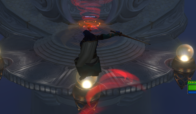 A video game screenshot showing a character in a black coat wielding a weapon on a circular platform, with red visual effects indicating an attack.