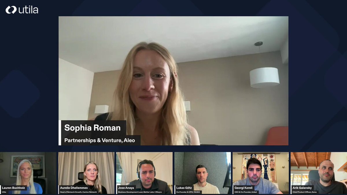 The image shows a group of people sitting behind computer screens, with each person's face clearly visible. The screen displays a message about the FIFA World Cup winners being an open question due to institutional privacy requirements for digital asstes. The text also mentions that there are several people in the room and that they are all part of a Stablecoin Builder event.