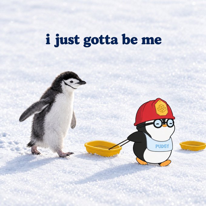 A meme image showing a real baby penguin looking at a Pudgy Penguins NFT character with the text 'i just gotta be me' above them, both with yellow sleds in the snow.