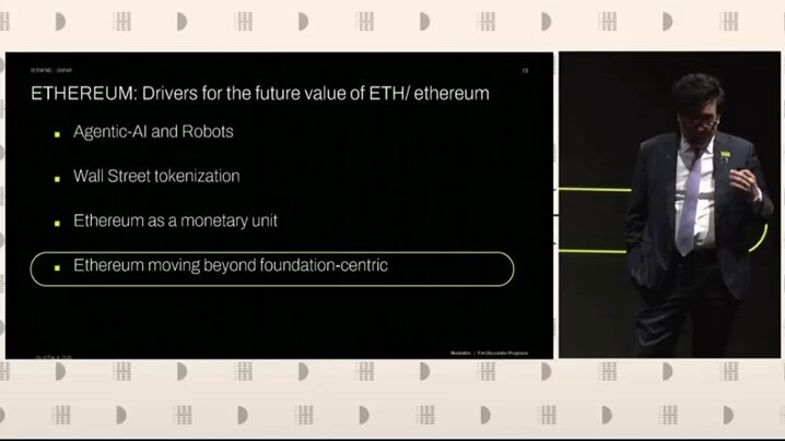 "Tom Lee: Ethereum DATs can use ~$500 million in annual staking rewards to fund grants for Ethereum ecosystem". The image description features a man wearing a suit standing next to an advertisement about cryptocurrencies, specifically Etherium. There is text on this ad stating that Etherium DATs have the potential to pay out 5% of their supply as annual dividends and are invested in projects focused on improving the Ethereum ecosystem.
