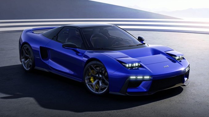 A front three-quarter view of the same blue JAZZ sports car, showing its LED headlights, hood vents, large alloy wheels with yellow brake calipers, and aggressive front styling.