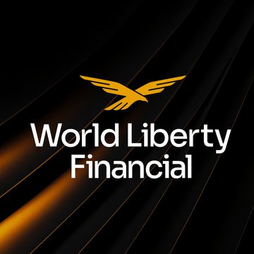 The image displays the World Liberty Financial logo, featuring a stylized golden eagle above the company name in white text against a sleek black background with diagonal gold accents. This branding represents the company that has just hired Ryan Ballantyne as its new chief business officer to lead global business strategy and partnerships.