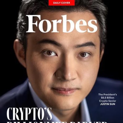 The cover of the Forbes magazine features a man wearing a suit, with his face prominently displayed against a black background. The title "Forbes" is written at the top of the cover, and the phrase "The President's Cryptopreneur" is written below him. The image also includes text that reads "紧跟Justin Sun最新战略布局", which could be a reference to the man featured on the cover or an article about his business.