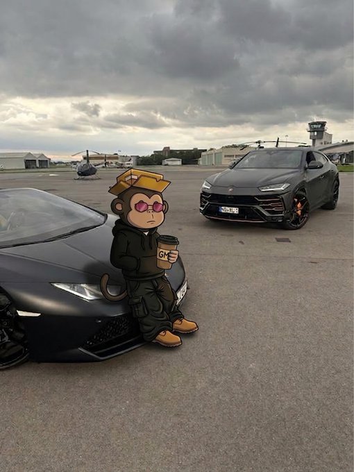 A cartoon monkey character wearing sunglasses, a hoodie, and boots leans against a black Lamborghini while holding a coffee cup labeled 'GM', with a black Lamborghini Urus parked nearby on an airport tarmac.