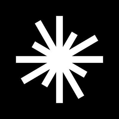 A white eight-pointed star or asterisk-like logo displayed on a black background.