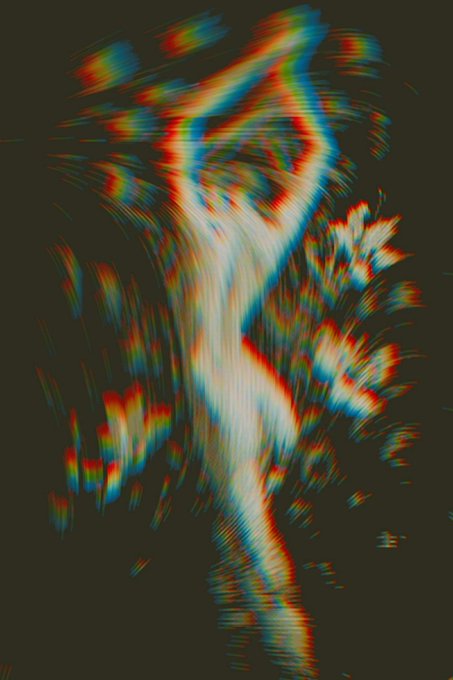 The image features an abstract painting with a blurred figure that appears to be dancing or twirling around. The colors used are vibrant, including shades of red, blue, green, and yellow. The background is dark, which contrasts with the colorful foreground element. The artist's name "Psychosis" can also be seen in the image.
