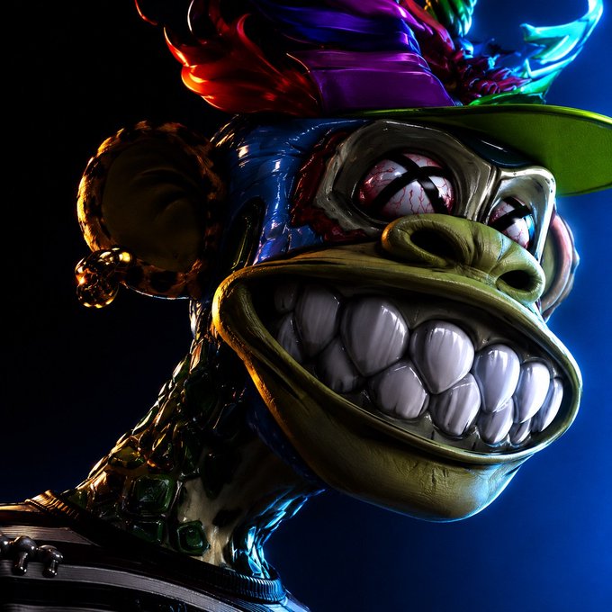 A grotesque, unsettling creature with an exaggerated wide grin full of sharp, yellowed teeth and bulging bloodshot eyes grins maniacally, embodying the dismissive, mocking "GM" troll sentiment aimed at Magic Eden.

**Key visual elements:**
- A menacing figure with wild colorful hair (red, purple, green, blue)
- Distorted facial features including a massive toothy smile and creepy eyes
- Dark dramatic lighting against a deep blue background
- Disturbing, almost grotesque 3D-rendered aesthetic

The creature's unsettling "creepy smile" visually amplifies the snarky, confrontational tone of shilling at the platform.