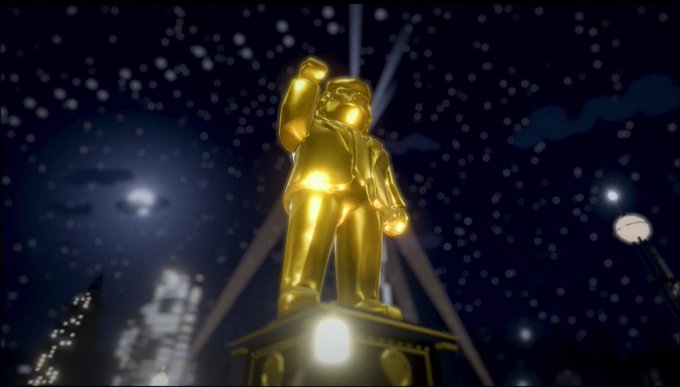 A golden statue of a muscular humanoid figure stands on a pedestal at night, surrounded by falling snow or bright particles and city lights.