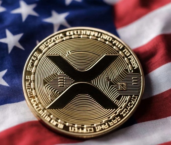 A gold XRP cryptocurrency coin rests on an American flag, symbolizing the potential U.S.-based adoption of XRP through Elon Musk's rumored X Money platform. The image visually reinforces the caption's speculation about XRP becoming a major real-world payment option alongside RLUSD.