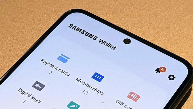 A Samsung smartphone screen displays the Samsung Wallet app showing categories including 7 Payment cards, 12 Memberships, and 1 Digital keys.