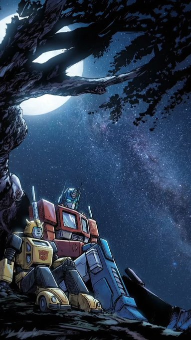 An artistic illustration depicts Transformers characters Bumblebee and Optimus Prime resting under a tree on a moonlit night with a starry sky featuring the Milky Way.