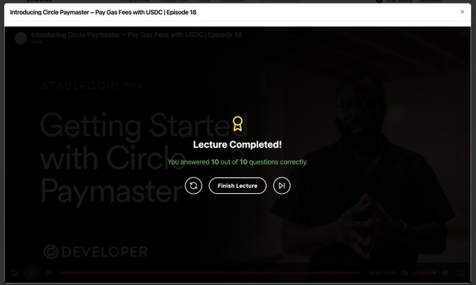 A screenshot of a 'Circle Paymaster – Pay Gas Fees with USDC | Episode 18' video showing a 'Lecture Completed!' notification with a perfect score of 10 out of 10 correct answers, featuring a 'Finish Lecture' button.