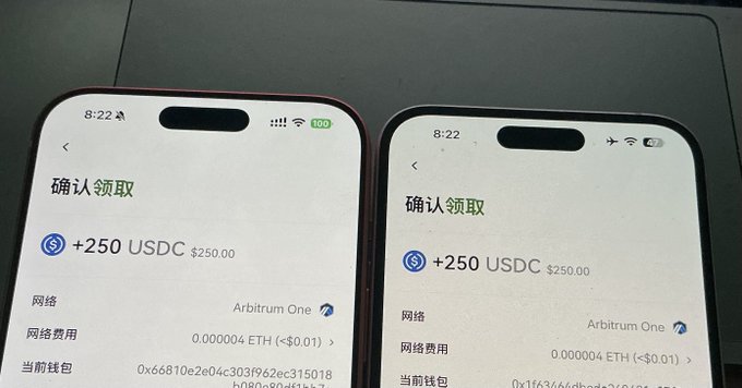 Two iPhones display a "确认领取" (Confirm to Claim) screen for +250 USDC each, totaling $500 split across two wallets on the Arbitrum One network, illustrating the $500 prize the user received from the OKX trading competition mentioned in the post.
