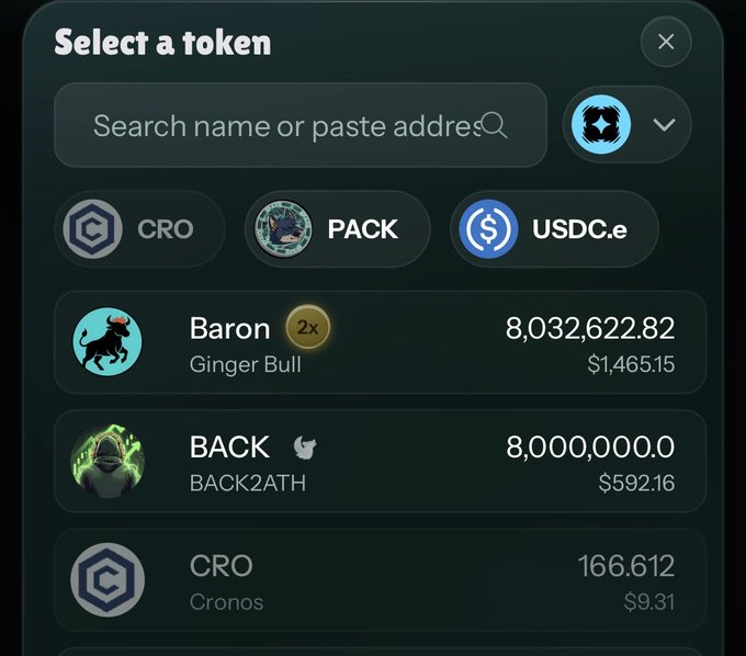A screenshot of a crypto wallet token selection interface showing balances for CRO (Cronos), PACK, USDC.e, Baron (Ginger Bull), BACK (BACK2ATH), and CRO, with the prompt 'Select a token.'