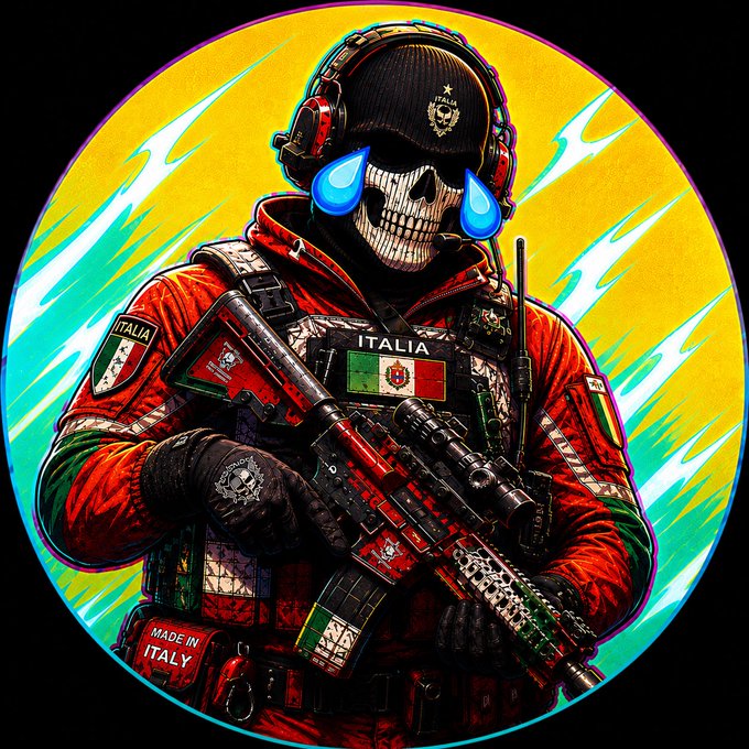An illustration of a skull-faced soldier in red and green tactical gear labeled 'ITALIA' and 'MADE IN ITALY', wearing headphones with blue glowing eyes and holding a rifle, set against a yellow and cyan background.
