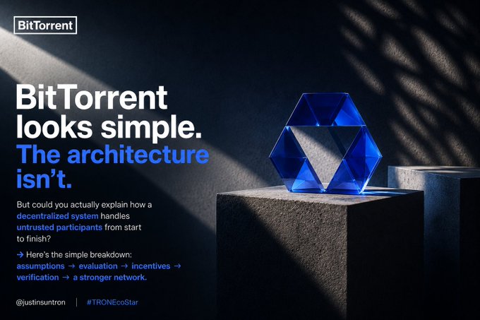 A promotional graphic with the "BitTorrent" logo features the text "BitTorrent looks simple. The architecture isn't." alongside an image of a blue glass hexagonal geometric sculpture on a pedestal, mentioning decentralization and crypto-related terms like #TRONEcoStar.