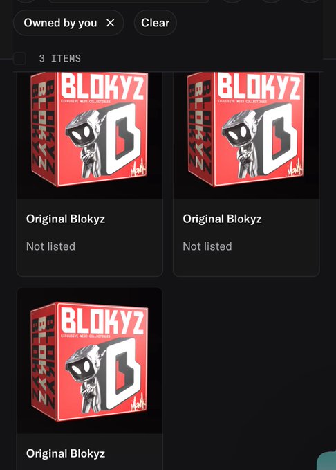 A dark-themed digital marketplace interface showing 3 items filtered "Owned by you," all displaying identical "Original Blokyz" NFT collectible boxes with red and white "BLOKYZ" branding, each marked as "Not listed." The image illustrates the user showing off their newly acquired Blokyz NFTs, matching the post's excitement about Blokyz day.