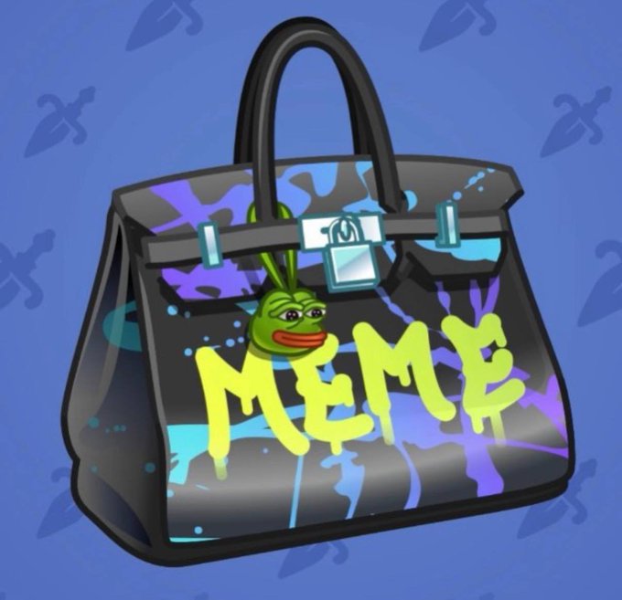 The image features a black handbag with blue and purple paint splatters, which has the word "MEME" written on it in yellow letters. The bag also contains a green frog head sticker that says "MEME". The background of the image is blue with white stars scattered throughout.