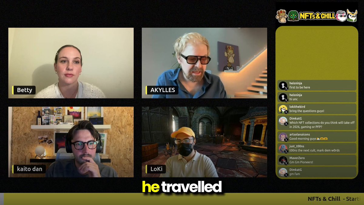The image features four people sitting around a table, with each person wearing glasses and looking at their respective computer screens. The screens display different scenes or images related to the game "Travelled", which appears to be an online multiplayer game. The group of friends seems to be engaged in a video call or playing together, as they are all focused on their screens.