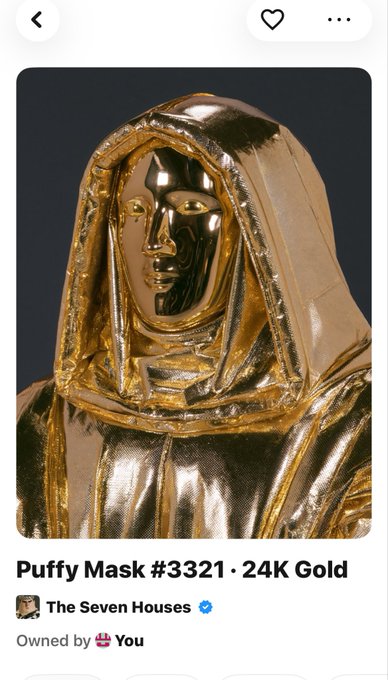 A screenshot of an NFT listing for "Puffy Mask #3321 · 24K Gold" owned by the user, minted by "The Seven Houses," showing a glossy golden hooded figure.