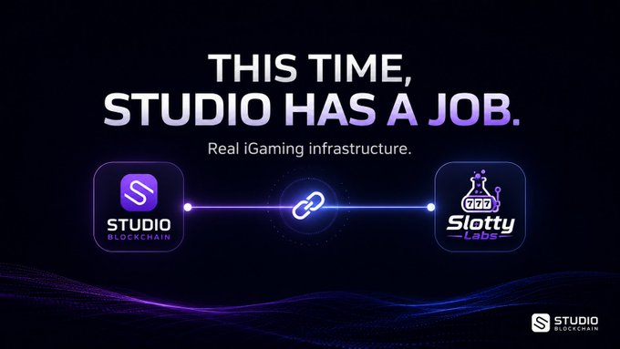 A promotional graphic reading 'THIS TIME, STUDIO HAS A JOB. Real iGaming infrastructure.' shows a connection between 'STUDIO BLOCKCHAIN' and 'Slotty Labs' logos linked by a chain link icon.