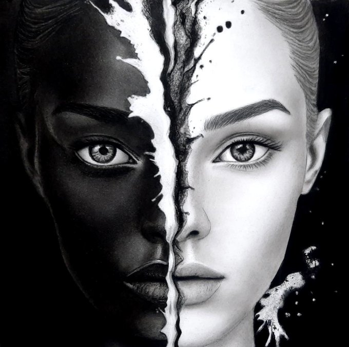 A black and white artistic portrait of a face split down the middle, with one side in dark shadow and the other in light.
