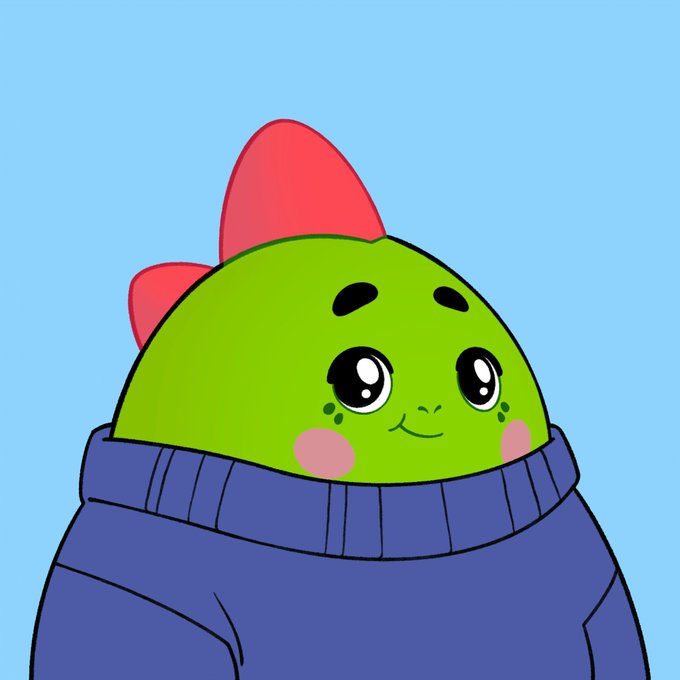 A cartoon illustration of a cute green character with large expressive eyes, pink cheeks, and a red bow on top, wearing a blue sweater.