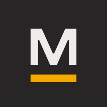 The image displays a stylized "M" logo with a yellow underline on a black background, representing Marathon Digital Holdings (MARA), the Bitcoin mining company referenced in the post about pledging 18,750 BTC as collateral for $600M in loans through Coinbase Credit and Two Prime Lending.