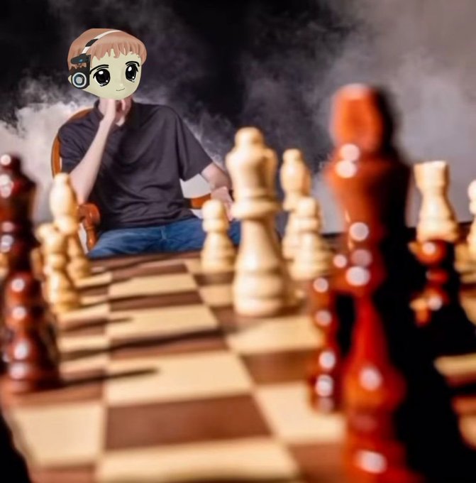 A young man wearing headphones sits in deep concentration behind a chessboard, his face replaced with an anime avatar, while chess pieces stand in the foreground as the post suggests a strategic "your move" challenge among grandmaster friends.